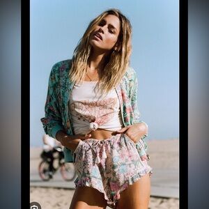 Spell small flower child retro tee!